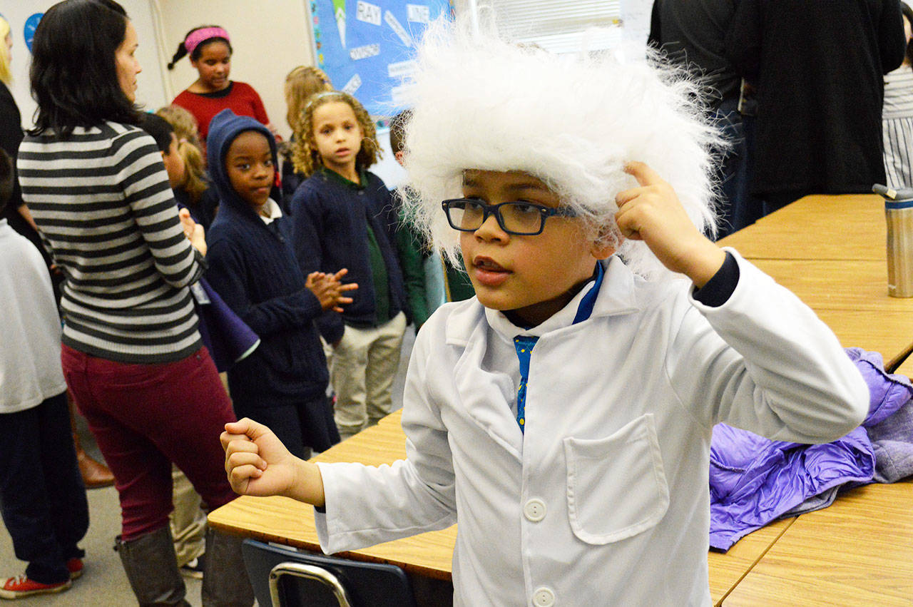 Jonas McGhee II gives a short presentation on his “hero” Albert Einstein Wednesday afternoon during Oak Harbor Elementary’s fourth-grade “interactive wax museum.” Photo by Laura Guido/Whidbey News-Times