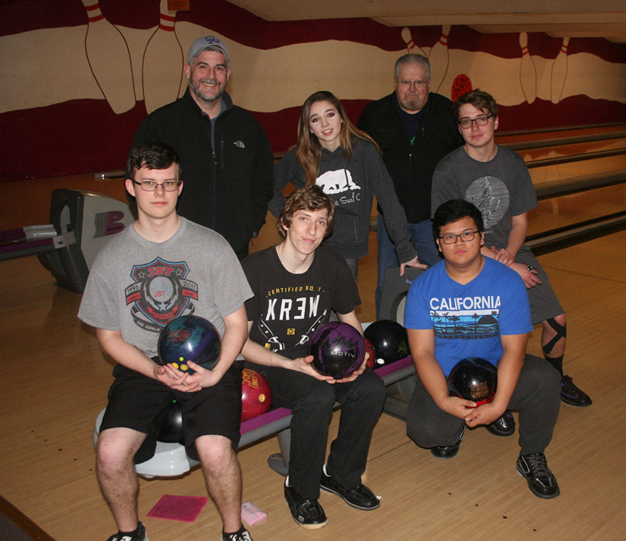 The Oak Harbor High School bowling team will be shooting for the state title next weekend. In the front row are Daniel Johnson, left, Devin McCardle and Earl Angeles. In the back are head coach Jason Youngsman, left, Megan Flood, assistant coach John Youngsman and Niko Hawkins. (Photo by Jim Waller/Whidbey News-Times)