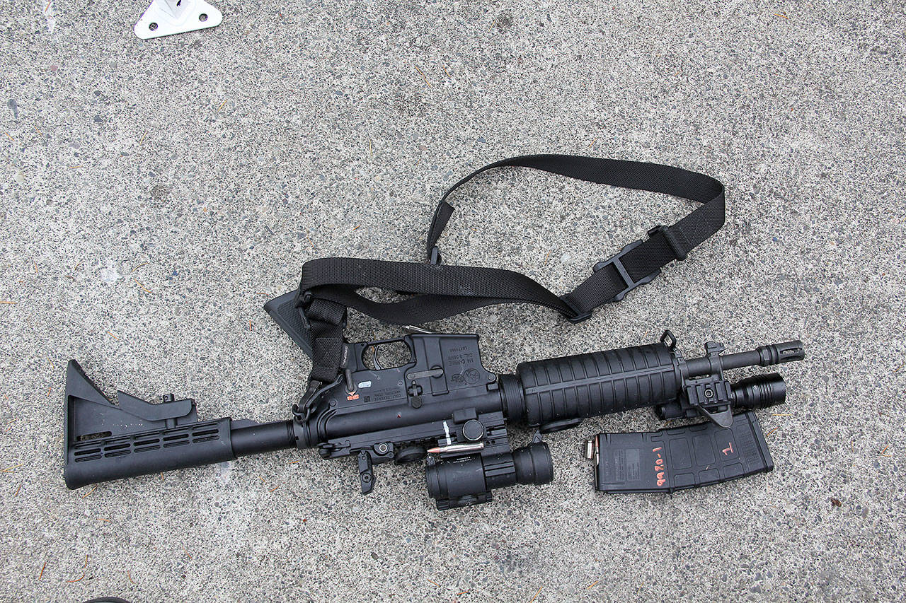 Photo provided                                A evidence photo taken by police shows a deputy’s AR-15 rifle that was involved in a police-related shooting on North Whidbey in September.