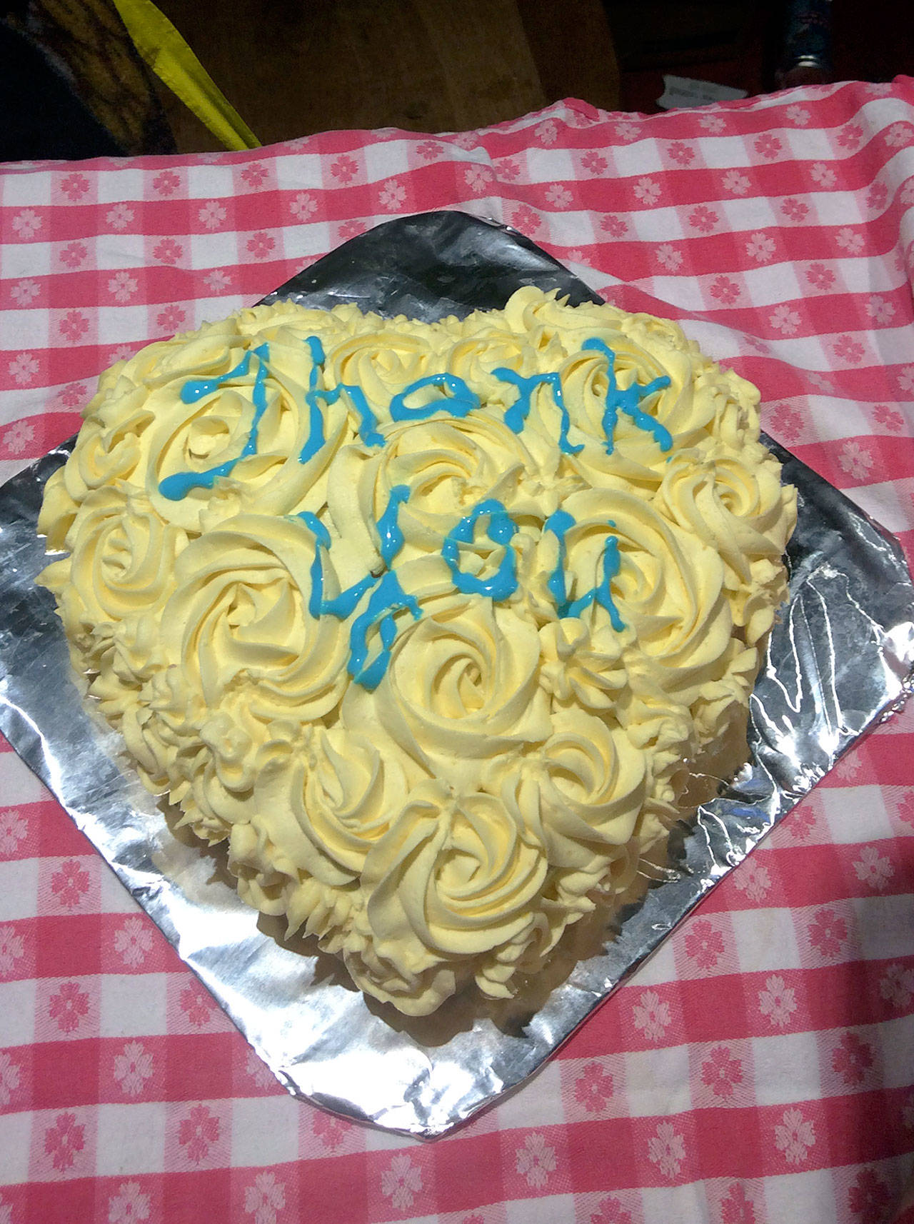 Contributed photo — Erin Kelly was so appreciative of Marc Swenson’s efforts that she baked him a “Thank You” cake.