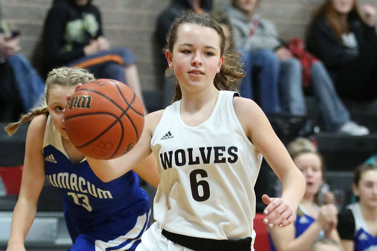 Photos of Wolves’ season-opening wins / Middle school girls basketball