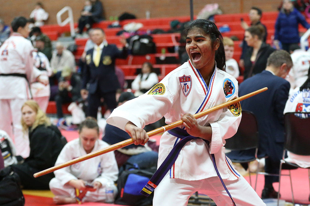 Sombia Newton competes in the Battle on the Island taekwondo tournament Saturday.(Photo by John Fisken)
