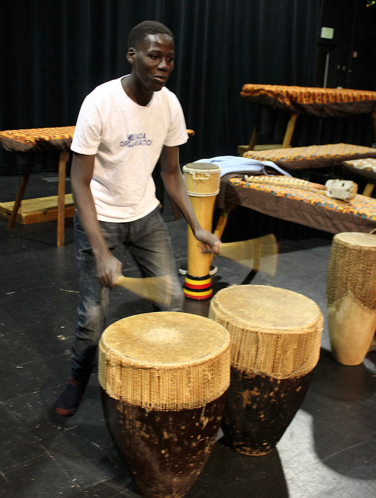 Drummer Bosco Okema of Dance of Hope seems in perpetual motion during performances.