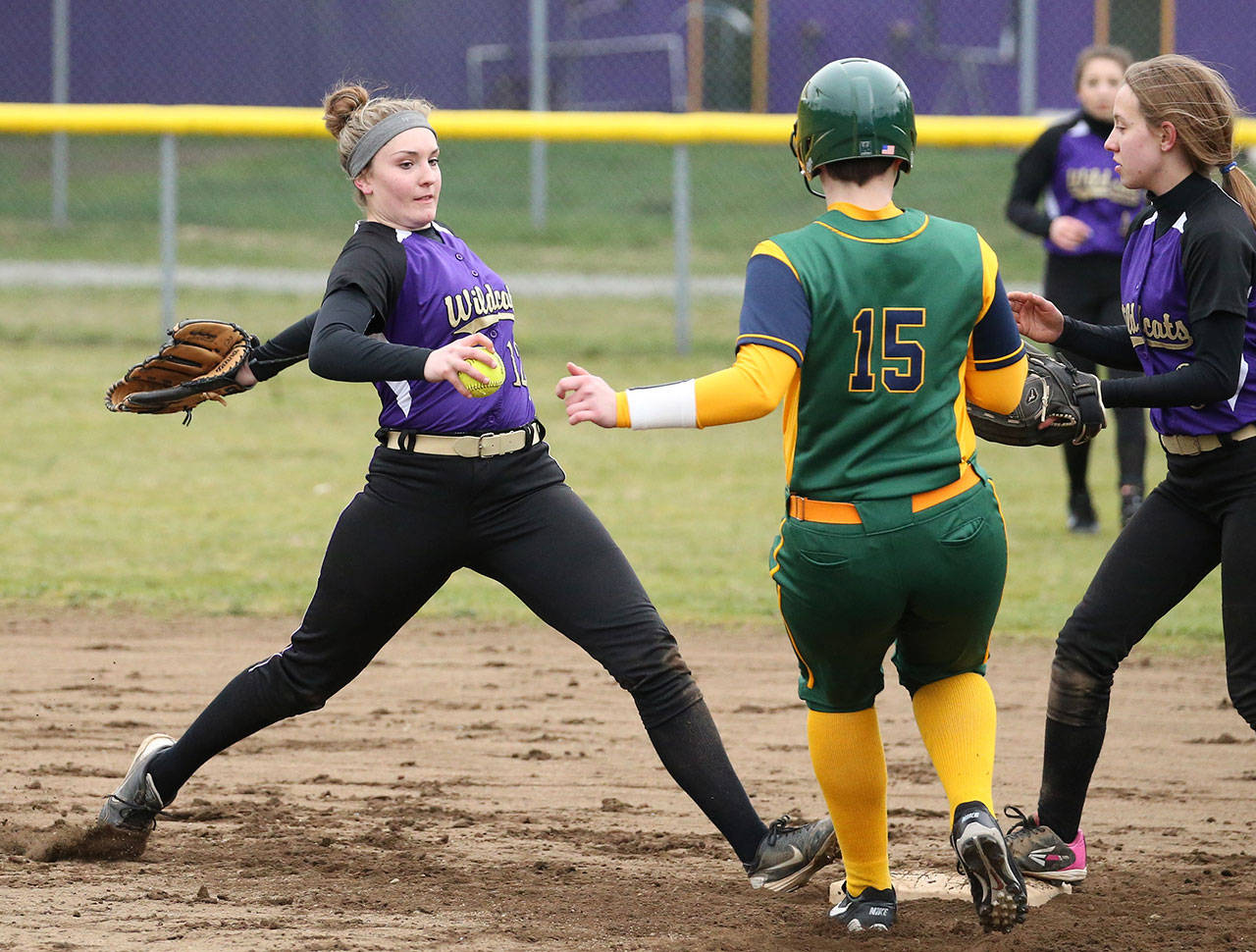 Oak Harbor shortstop Rhylee Joseph beats an opponent to the bag in a game last year. (Photo by John Fisken)