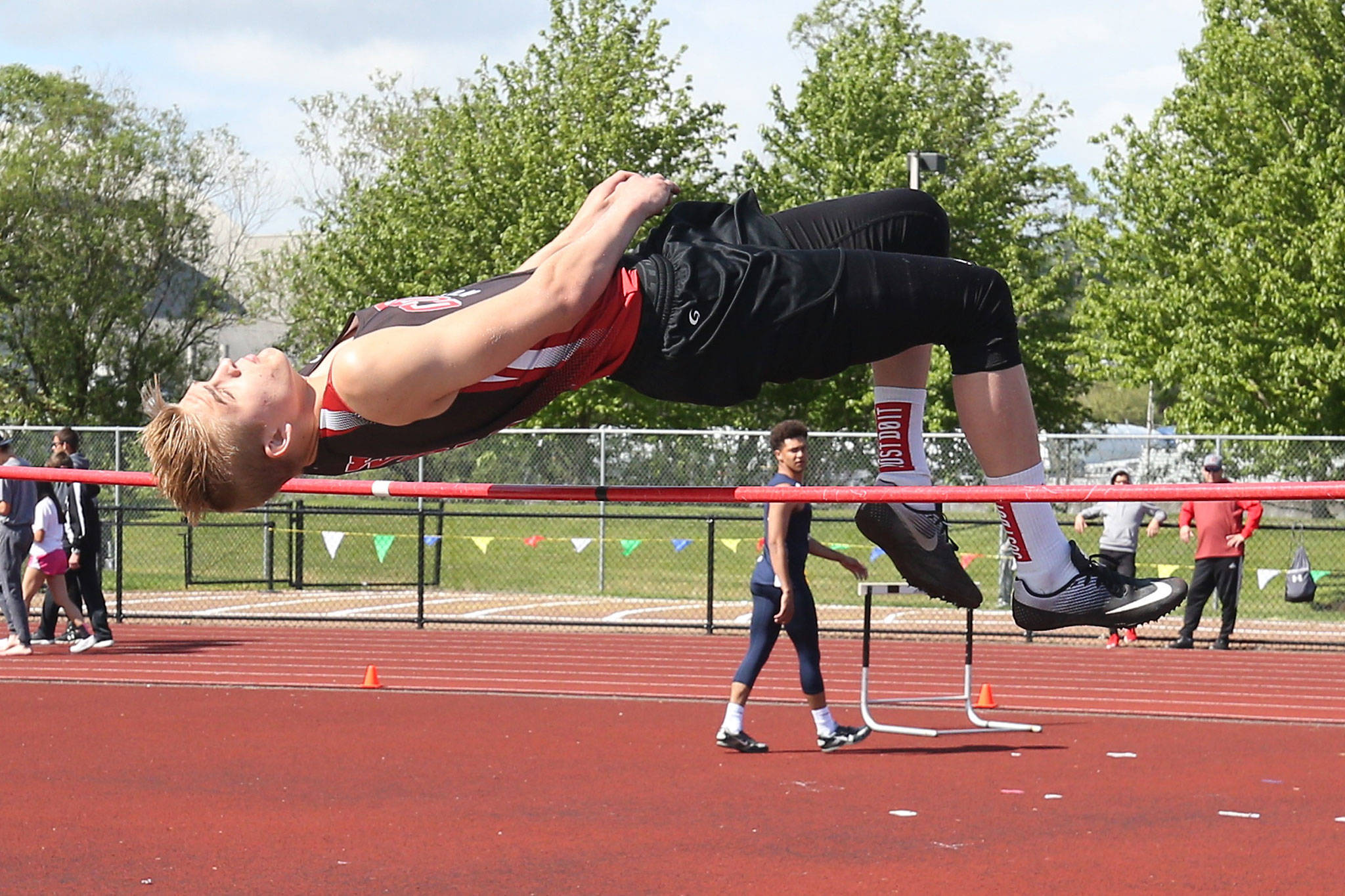 Coupevilles Ariah Bepler is the defending Olympic League high jump champion. He also placed ninth in the state meet in the event. (Photo by John Fisken)