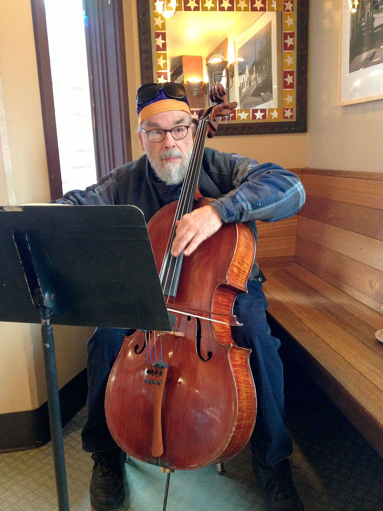 Photo by Drew Kampion                                Buell Neidlinger played the cello on Whidbey Island in recent years, but he was world famous for his bass playing. He passed away March 16.