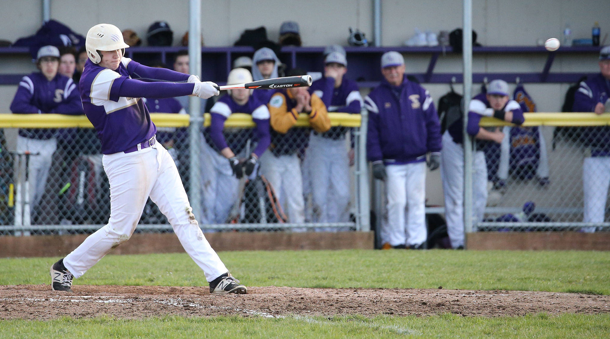 Thomas Anderson slugs one of Oak Harbors 10 hits Friday against Marysville-Pilchuck. (Photo by John Fisken)