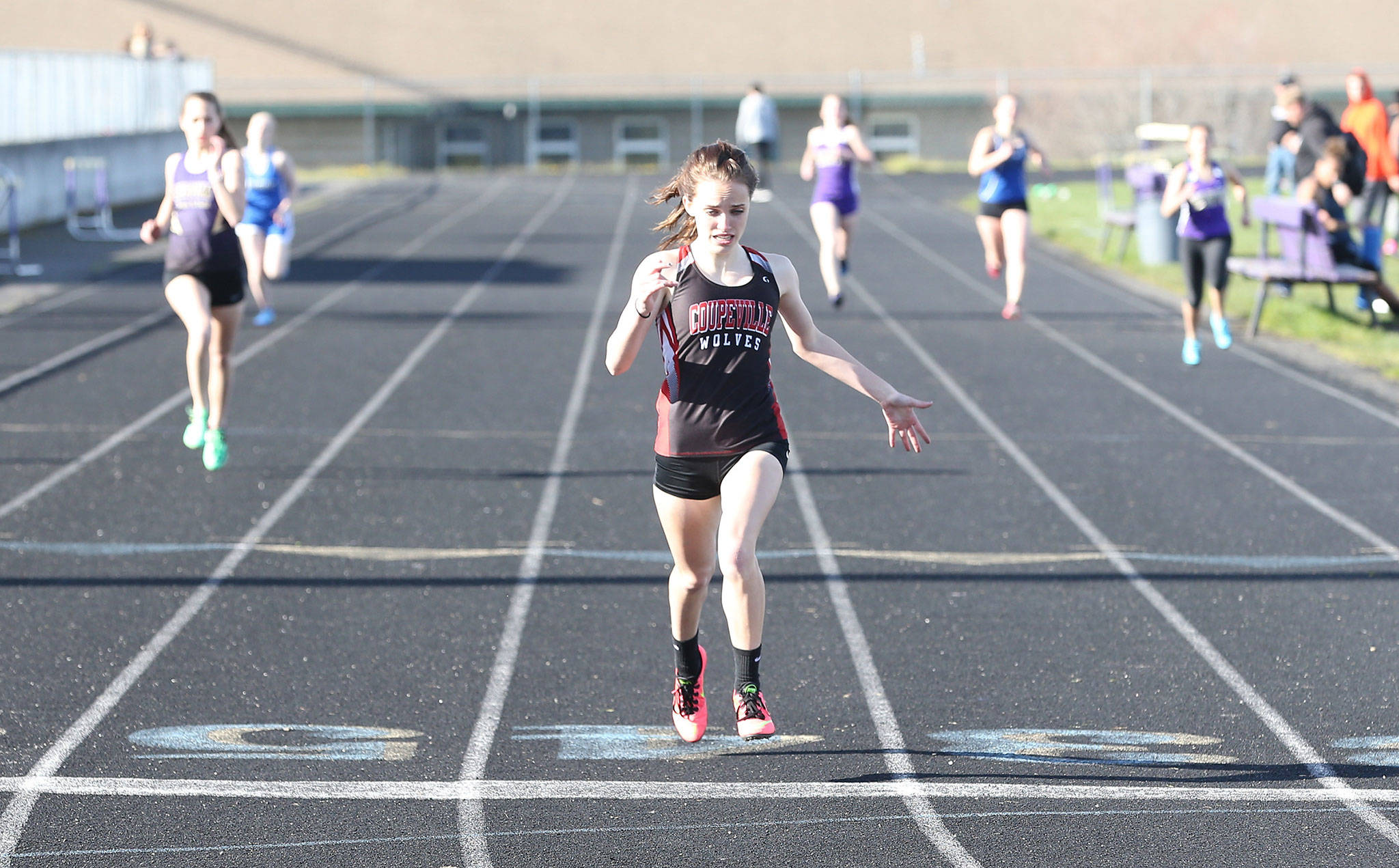 Coupeville’s Mallory Kortuem overwhelms the field in the 400 meters in Wednesday’s meet at Sequim.(Photo by John Fisken)