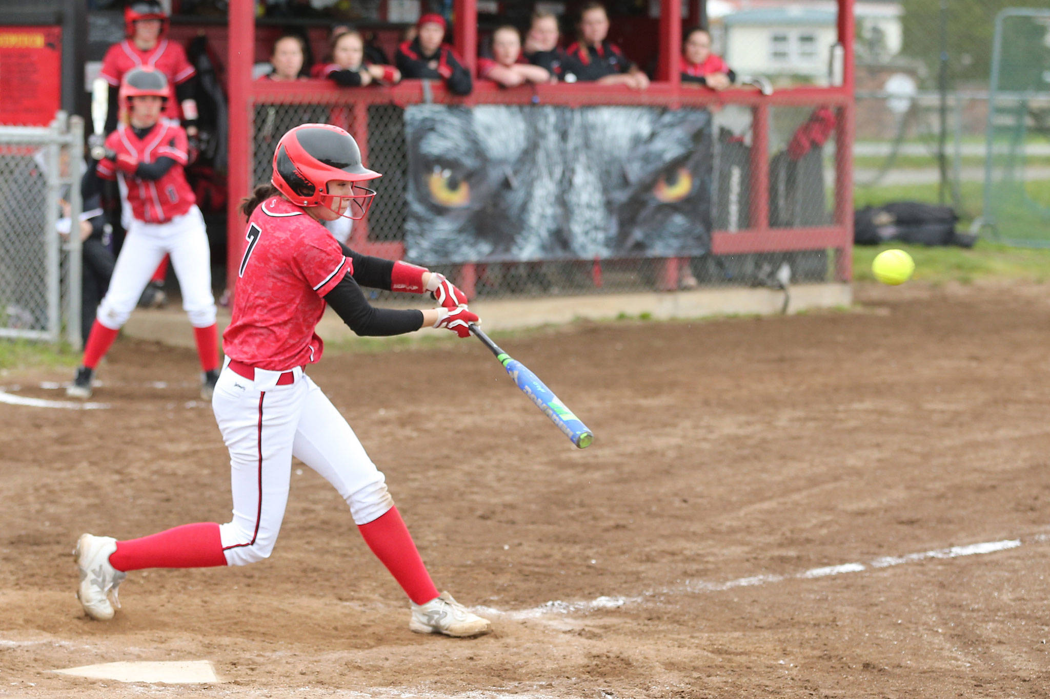 Scout Smith smacks the ball in Coupeville’s title-clinching game with Klahowya Friday.(Photo by John Fisken)