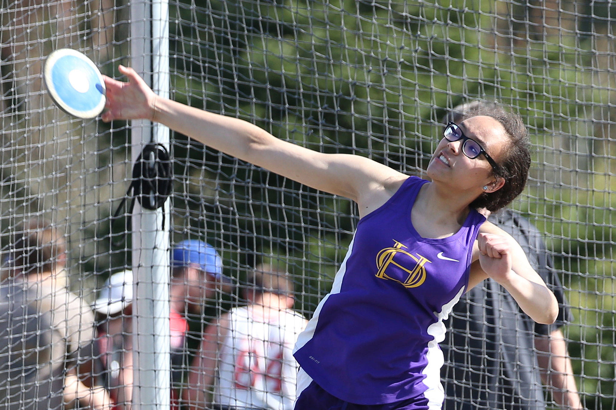 Oak Harbors Jasmine Ford hurls the discus in Thursdays meet. She finished first with a throw of 101-04.(Photo by John Fisken)