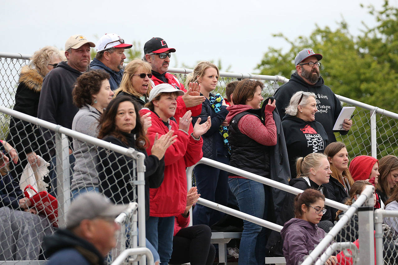 The Coupeville crowd celebrates the Wolves’ big win over Chimacum Friday.(Photo by John Fisken)