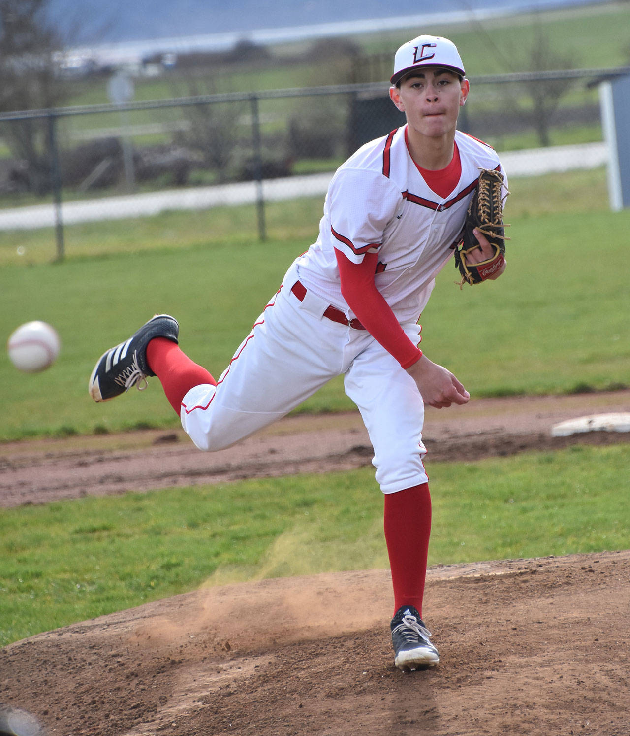 Hunter Smith, shown here pitching in a game earlier this season, pitched a no-hitter in his final game on the Coupeville High School diamond Wednesday. (Photo by Karen Carlson)