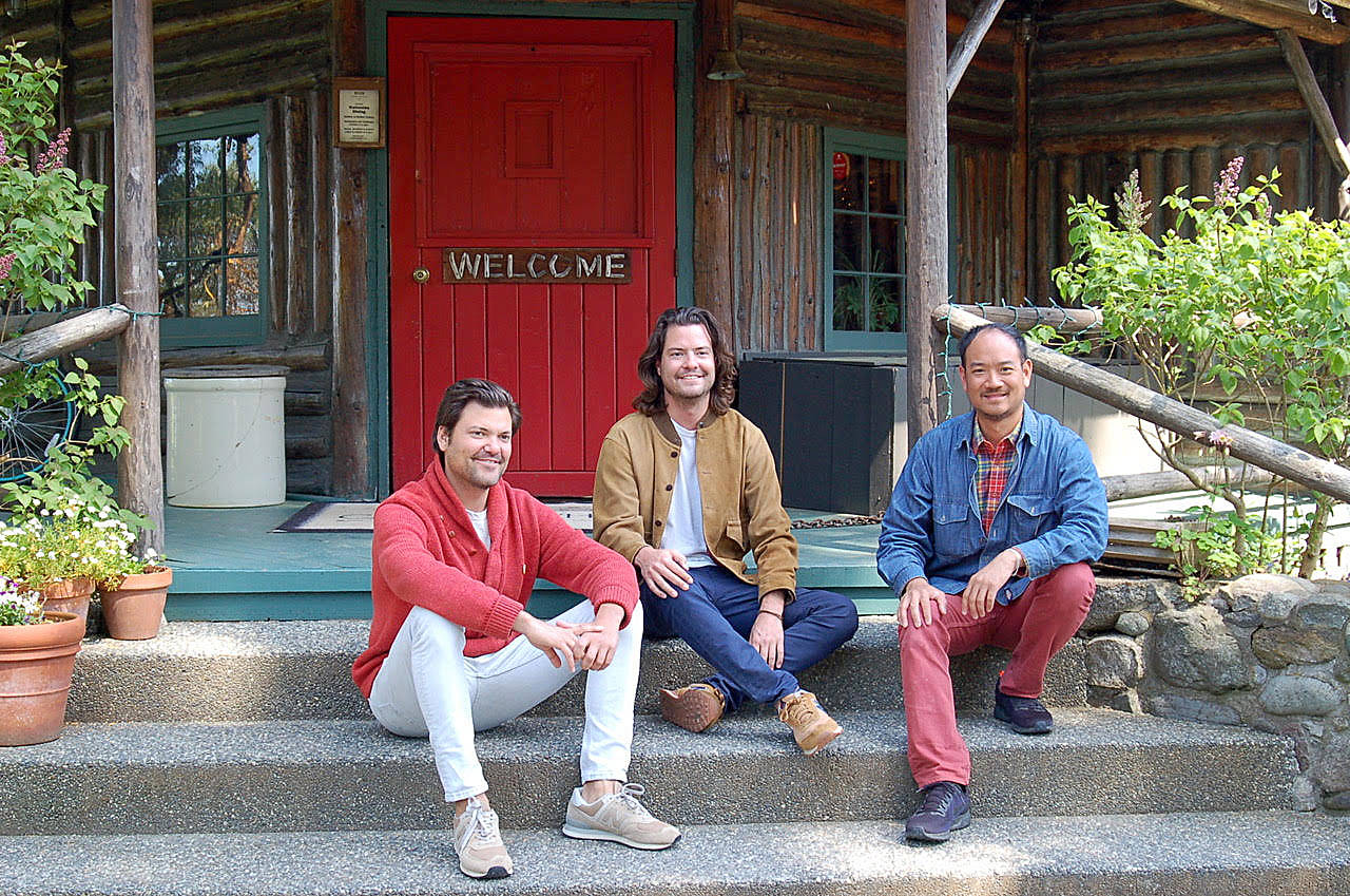 Photo by Rick Chapman                                New owners of Central Whidbey’s historic Captain Whidbey Inn are, from left, Matt French, his brother, Mike, and Eric Cheong. The three take a break on the inn’s porch. For the full story, see page A9 of today’s Whidbey News-Times