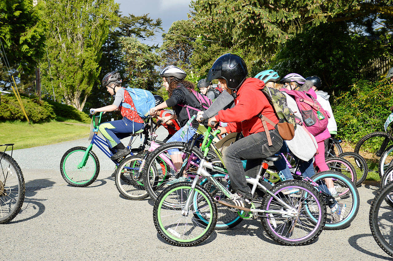 Fourth and fifth graders set off to school Wednesday morning as part of national Bike and Walk to School Day. Over 50 Coupeville Elementary School students participated in the first annual event. Photo by Laura Guido/Whidbey News Times