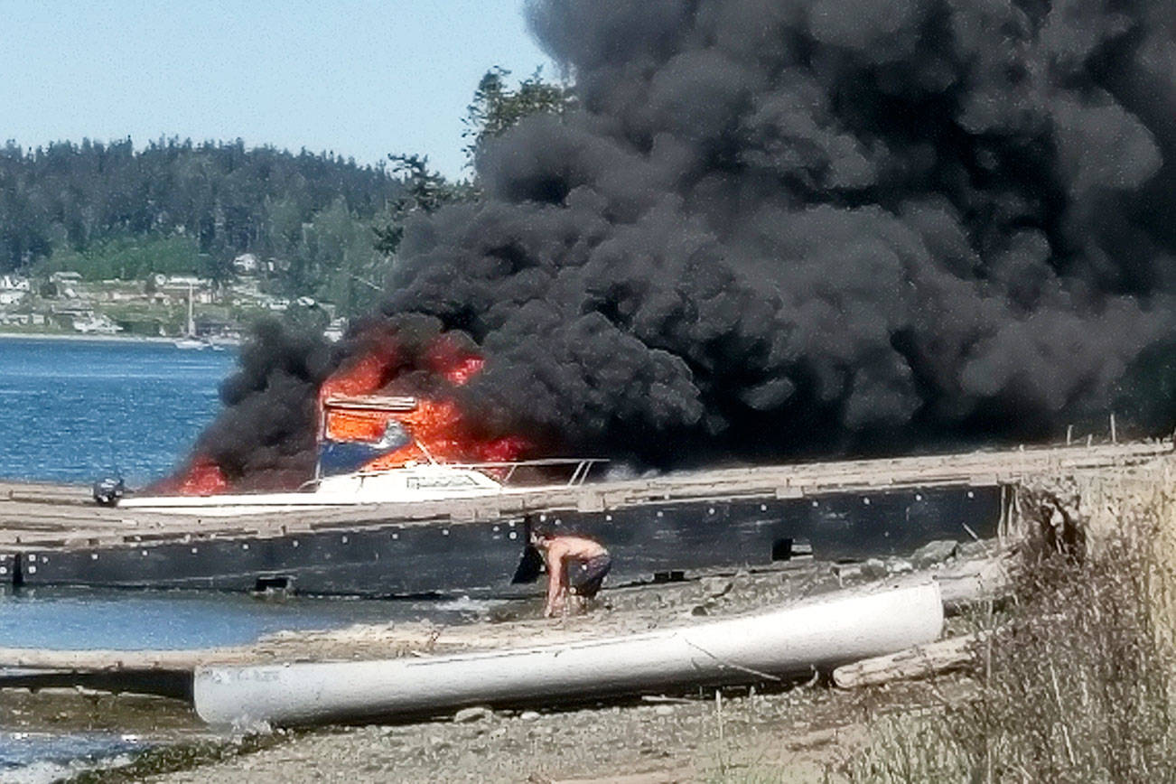 Man injured in boat fire at Cornet Bay Marina; two docks destroyed