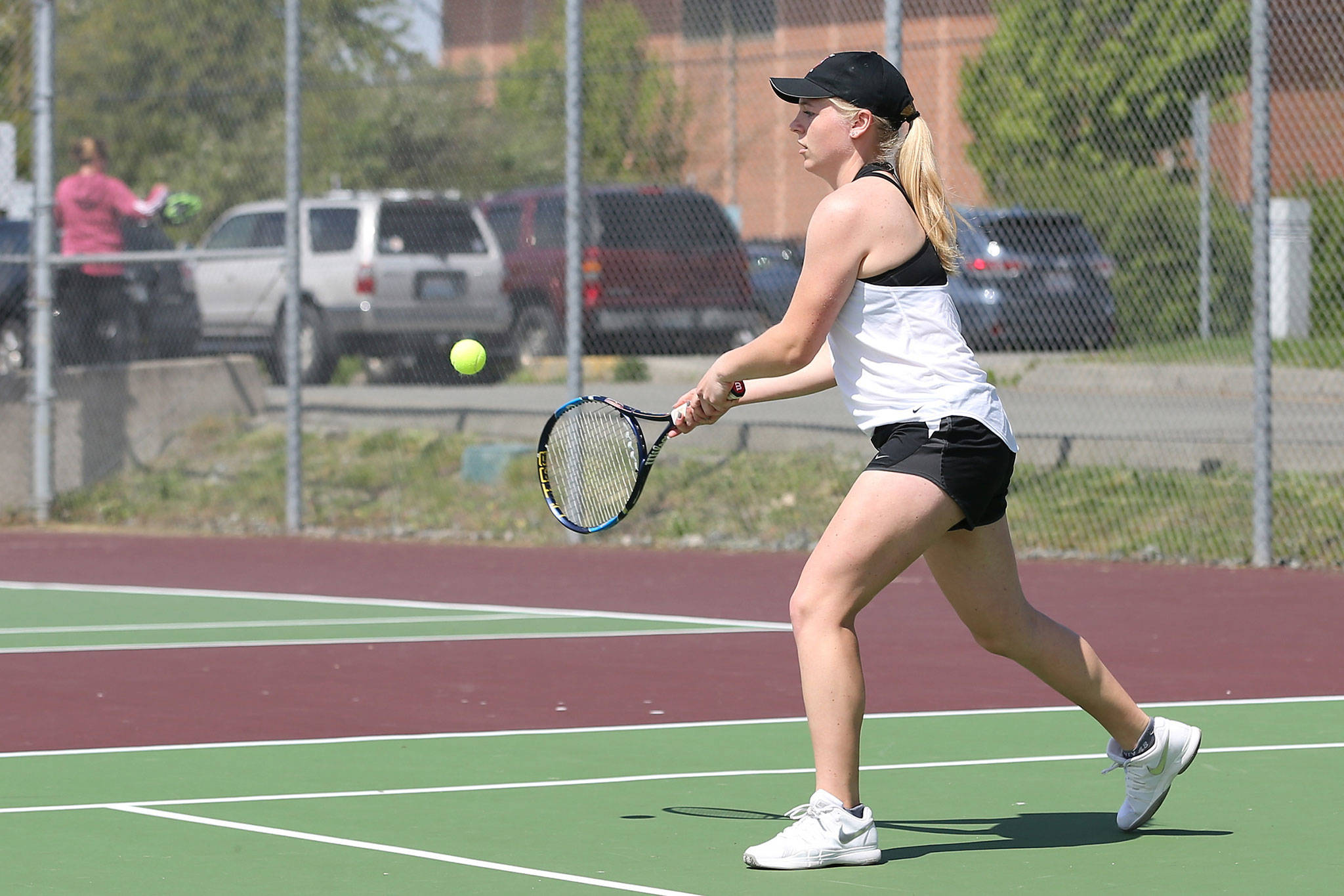 Sage Renninger, above, teamed with Payton Aparicio to win the league doubles title May 7. This week the pair is playing for the district crown and a state berth.(Photo by John Fisken)