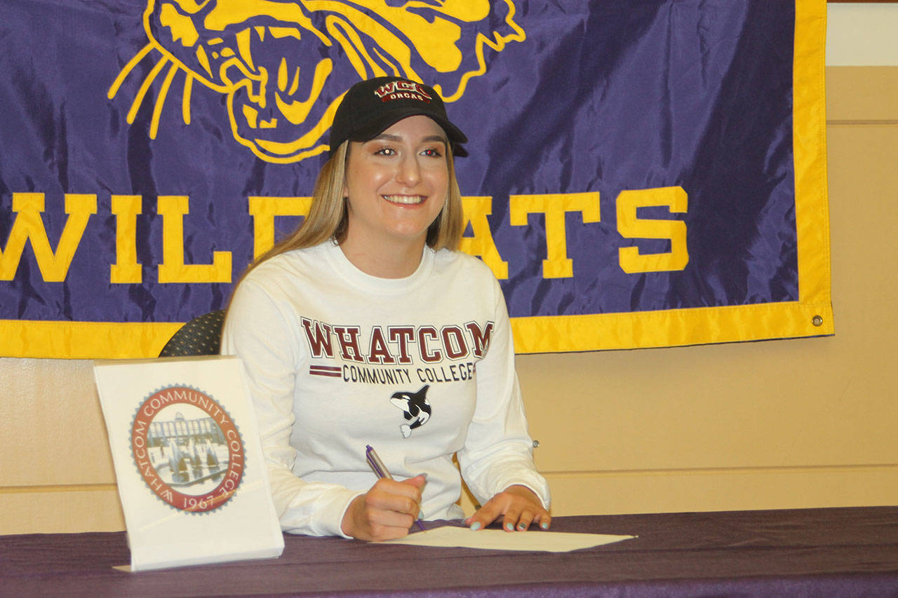 Samantha Hines signed a letter of intent to play volleyball for Whatcom Community College next school year. (Photo by Jim Waller/Whidbey News-Times).