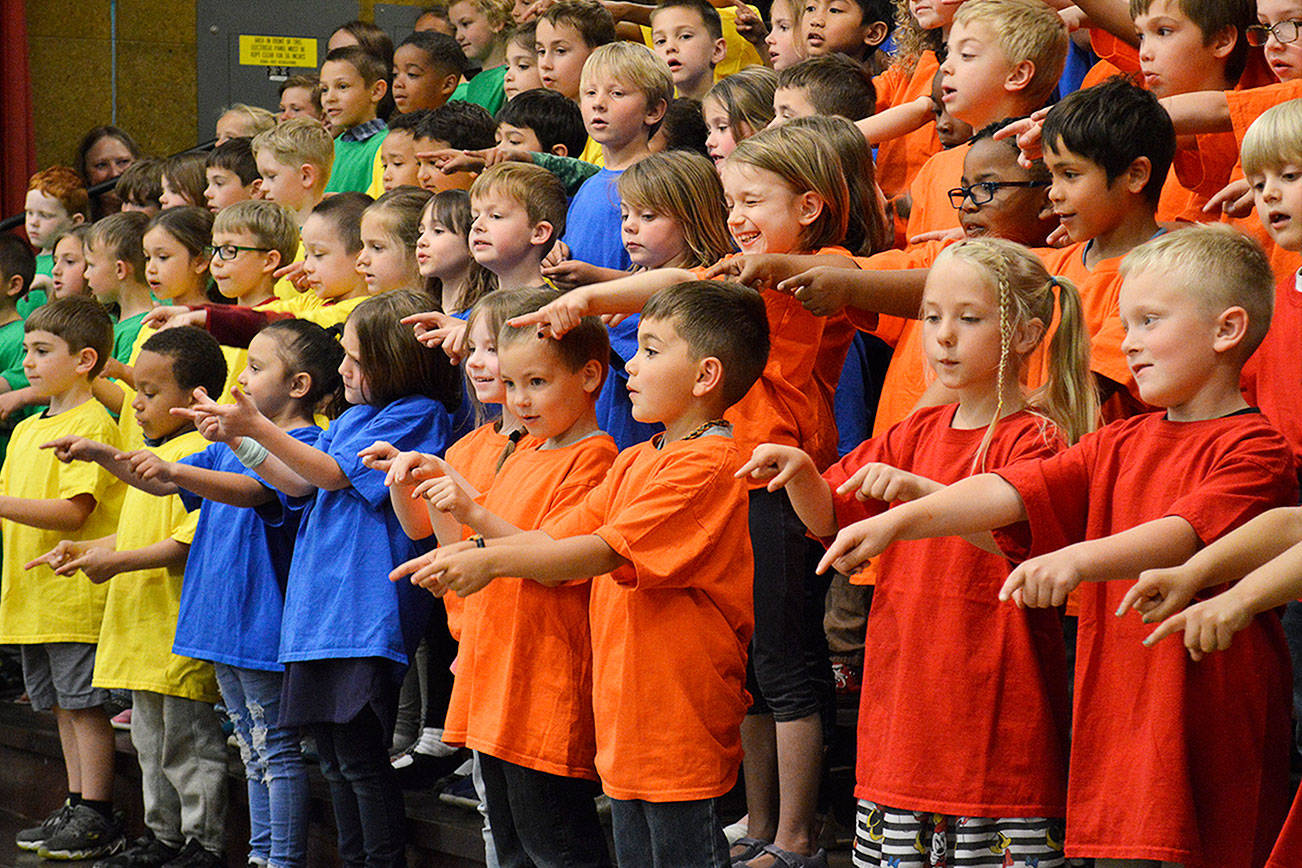 Students perform songs from around the world