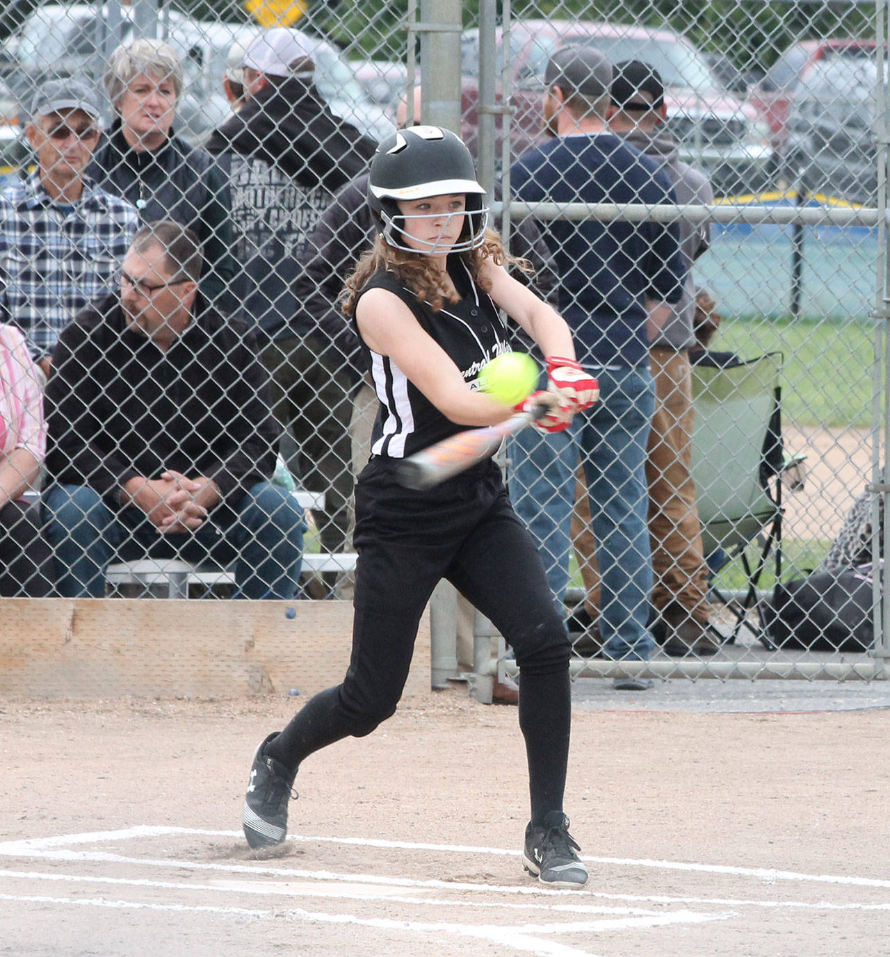 Gwen Gustafson leads of the game with a base hit.(Photo by Jim Waller/Whidbey News-Times)