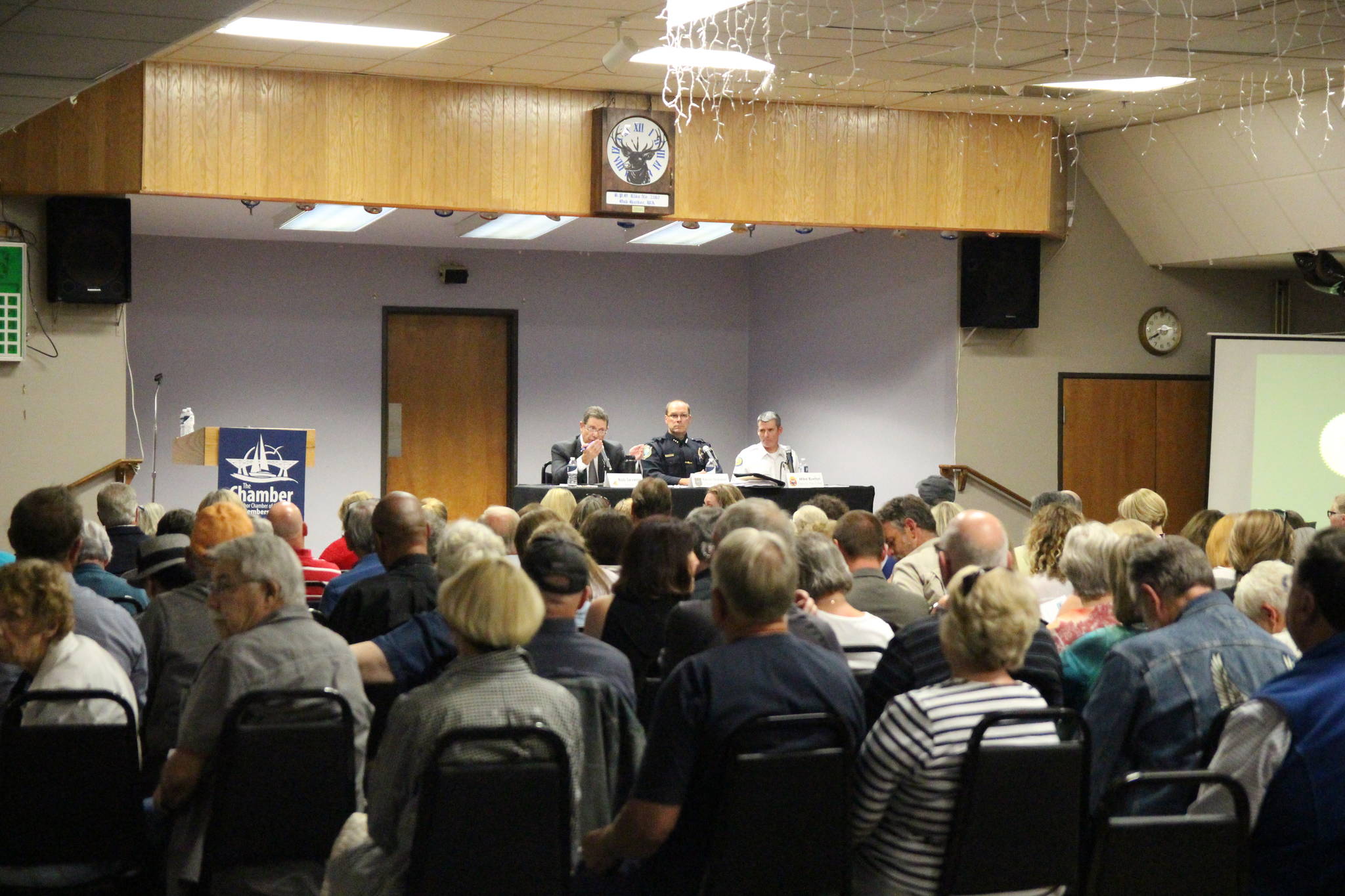 Oak Harbor Mayor Bob Severns, Police Chief Kevin Dresker, and deputy fire chief Mike Buxton addressed the audience’s concerns. Photo by Emily Gilbert/Whidbey News-Times