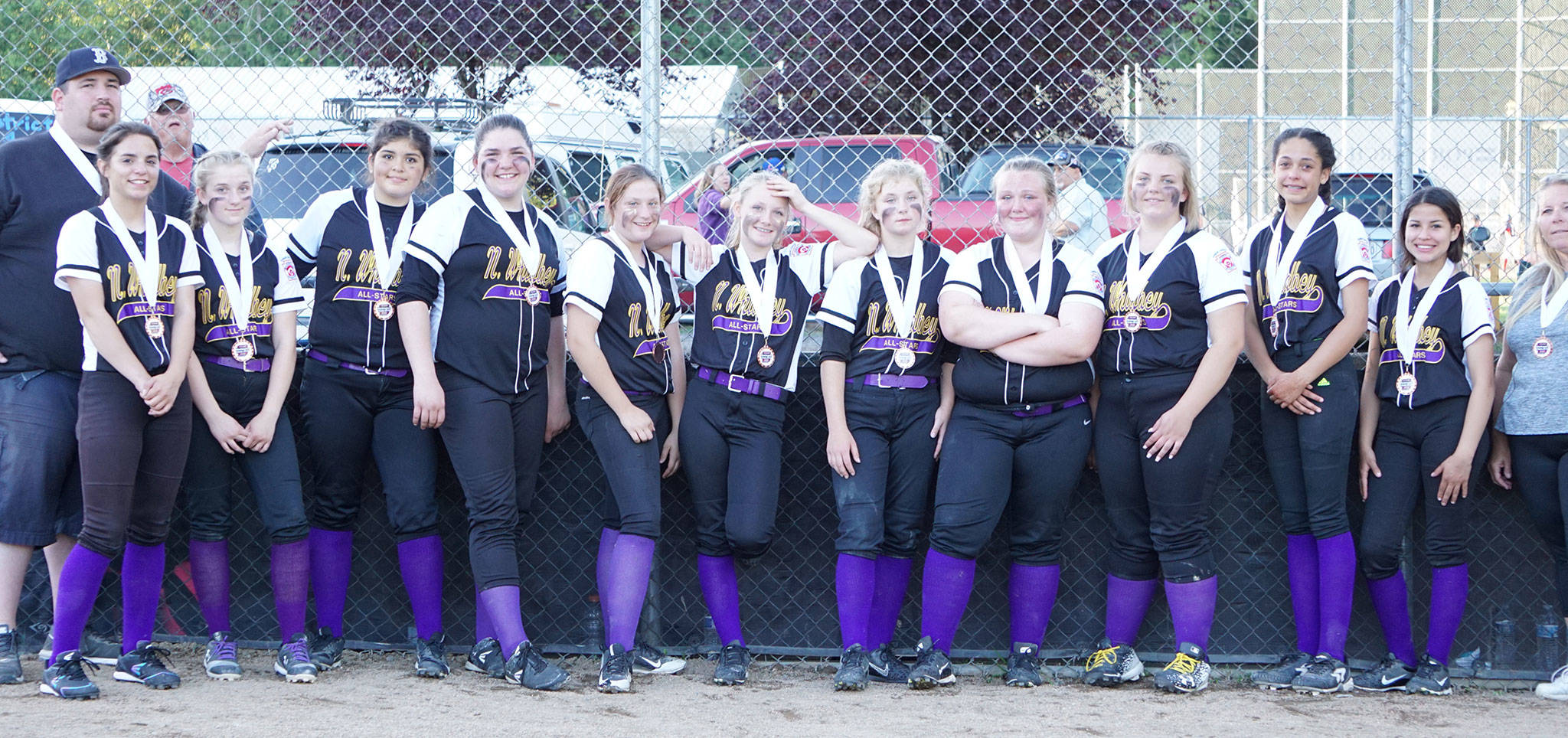 The North Whidbey Junior Softball team shows off their state medals. (Photo submitted by Gerry Oliver)