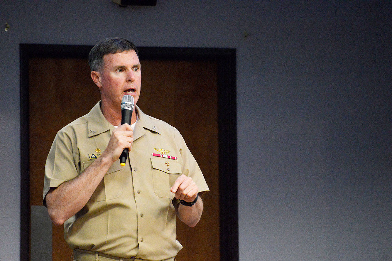 Capt. Geoffrey Moore, base commanding officer, presents a “State of the Station” update Thursday to the Oak Harbor Chamber of Commerce at the Elk’s Lodge. Photo by Laura Guido/Whidbey News-Times