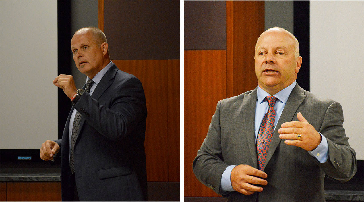 Lane Campbell, left, and Rick Felici, candidates for sheriff, share their ideas for improving the department.                                Photos by Laura Guido/Whidbey News-Times
