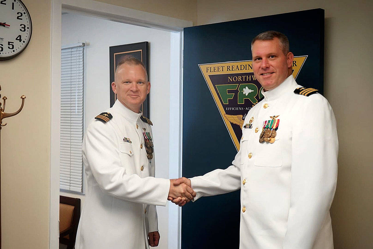 Commander Vondrak (right) welcomes Commander Palmer (left) on June 28, 2018. Photo provided.