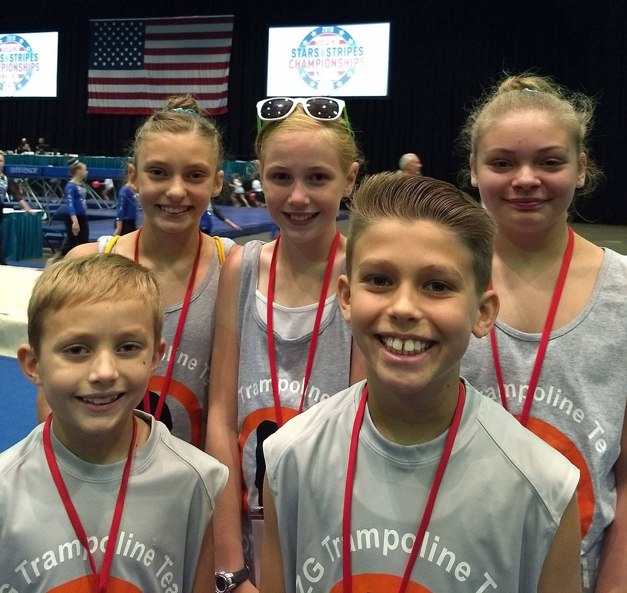 Trevor Haskins, bottom right, captured a gold medal at the national trampoline and tumbling championships in Reno this month. He was joined at the meet by Ryder Chaffins, bottom left, and Kenzie Chaffins, top left, Allison Lovett and Kaitlyn Rozycki. (Submitted photo)