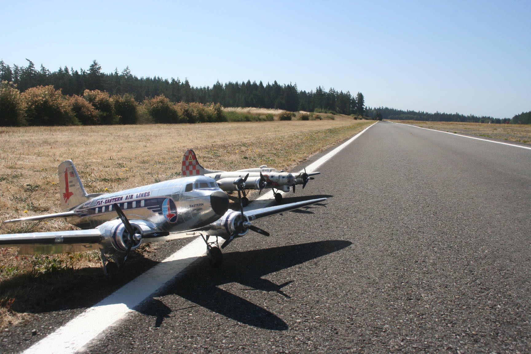 Whidbey Island Radio Control society members come out to Naval Outlying Field on most Saturday mornings to fly class model airplanes and other aircraft, such as these. Photo by Emily Gilbert/Whidbey News-Times