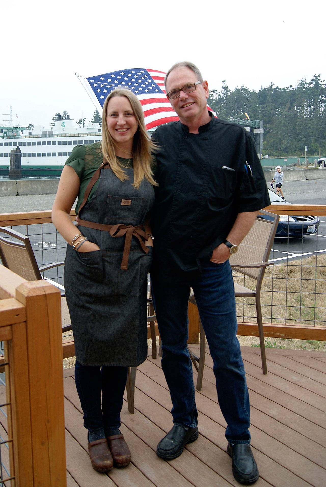 Photo by Maria Matson / Whidbey News- Times.                                Emily Harding Hill and Michael Weeks stand outside their restaurant Callen’s, which opened on July 31 near the Coupeville Ferry Terminal.