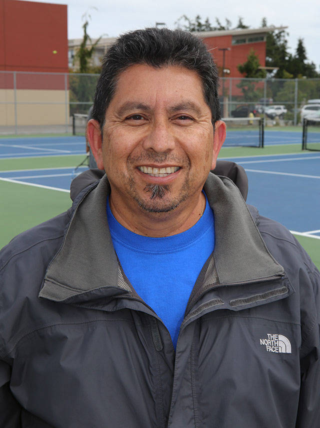 New Oak Harbor tennis coach Tino Gutierrez. (Photo by John Fisken)