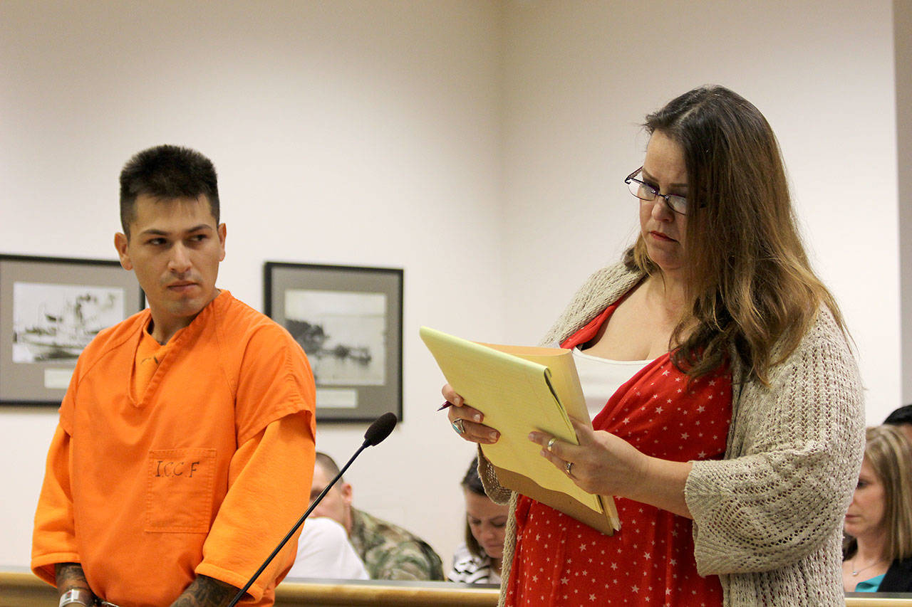 Photo by Jessie Stensland / Whidbey News-Times.                                Carlos Martinez appears in court Monday with attorney Teresa Keene.