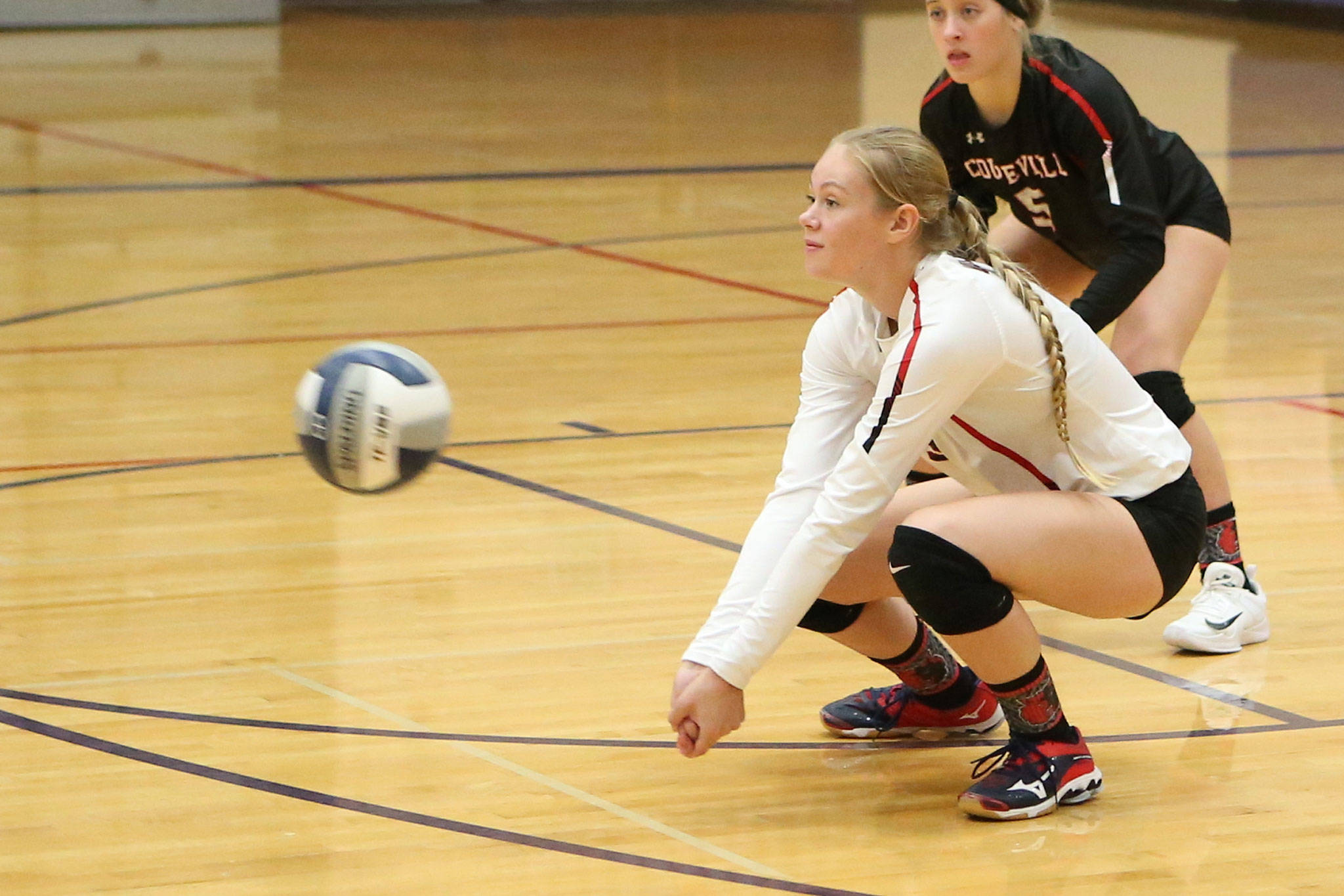 Chelsea Prescott and the Coupeville volleyball team competes in the Oak Harbor jamboree Saturday.(Photo by John Fisken)