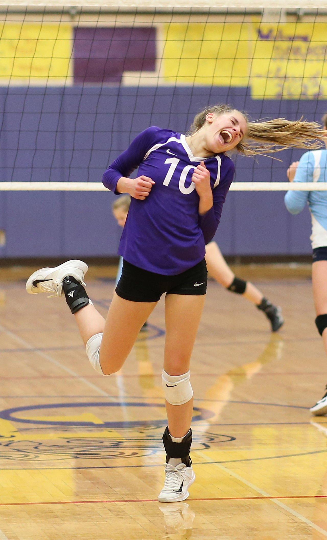 Morgan Pease celebrates a key point in the exciting battle with Meadowdale.(Photo by John Fisken)