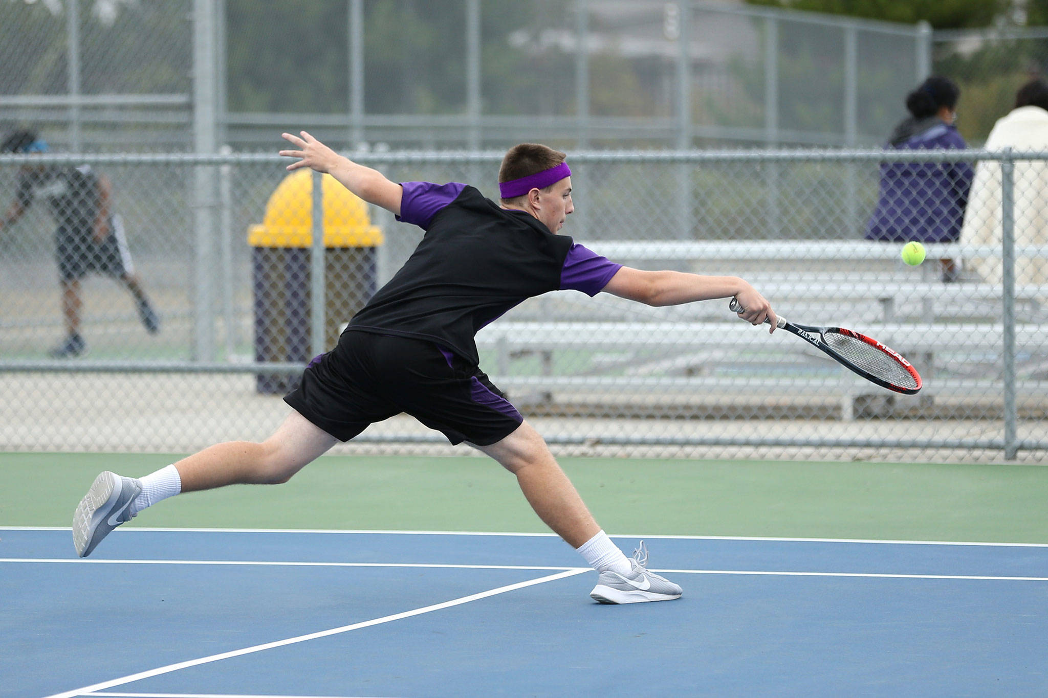 Samuel Peek hustles to the ball in Tuesday’s match with Meadowdale.(Photo by John Fisken)