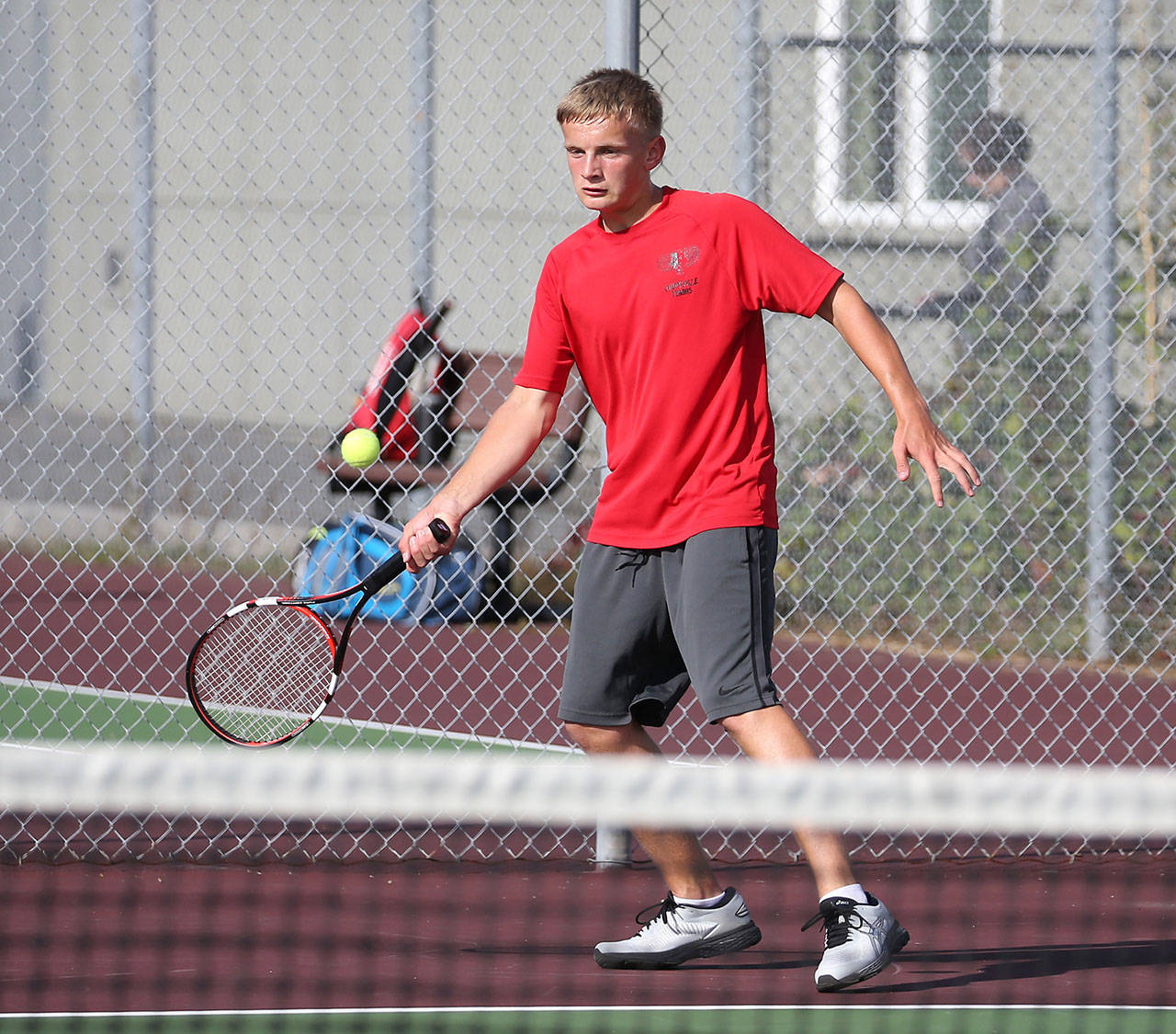 Drake Borden returns a shot in his win in second doubles Tuesday. (Photo by John Fisken)