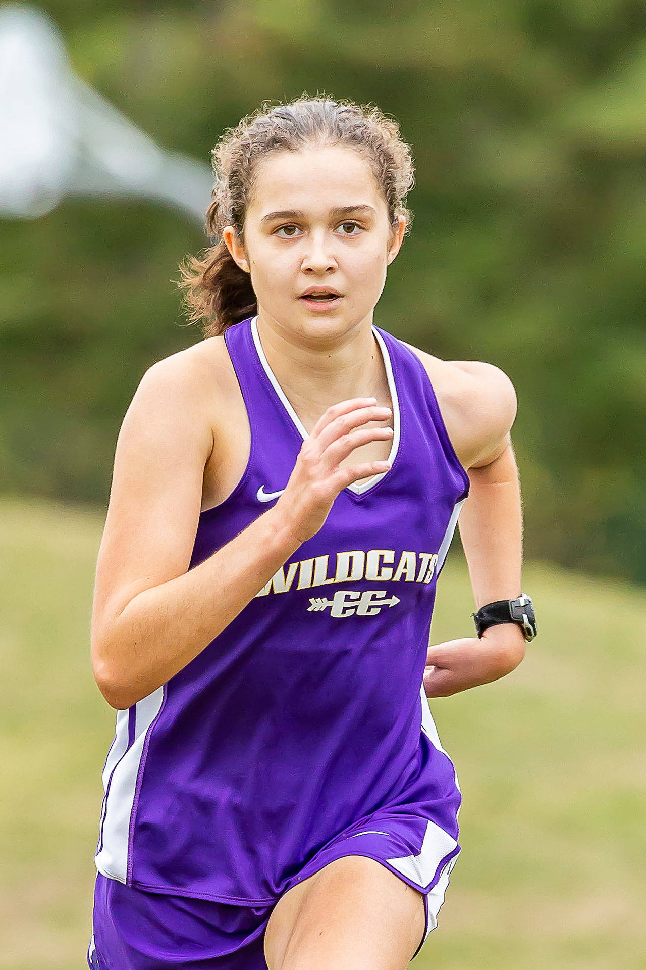 Alex Smith places third among the girls and first for Oak Harbor.(Photo by John Fisken)