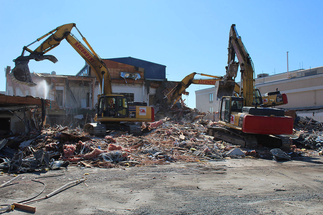 Photo provided                                The former bank building on Pioneer Way in Oak Harbor is being torn down. The site will be converted to parking for the new sewage treatment plant.