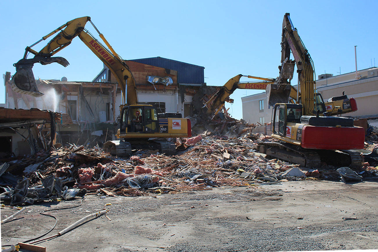 Photo provided                                The former bank building on Pioneer Way in Oak Harbor is being torn down. The site will be converted to parking for the new sewage treatment plant.