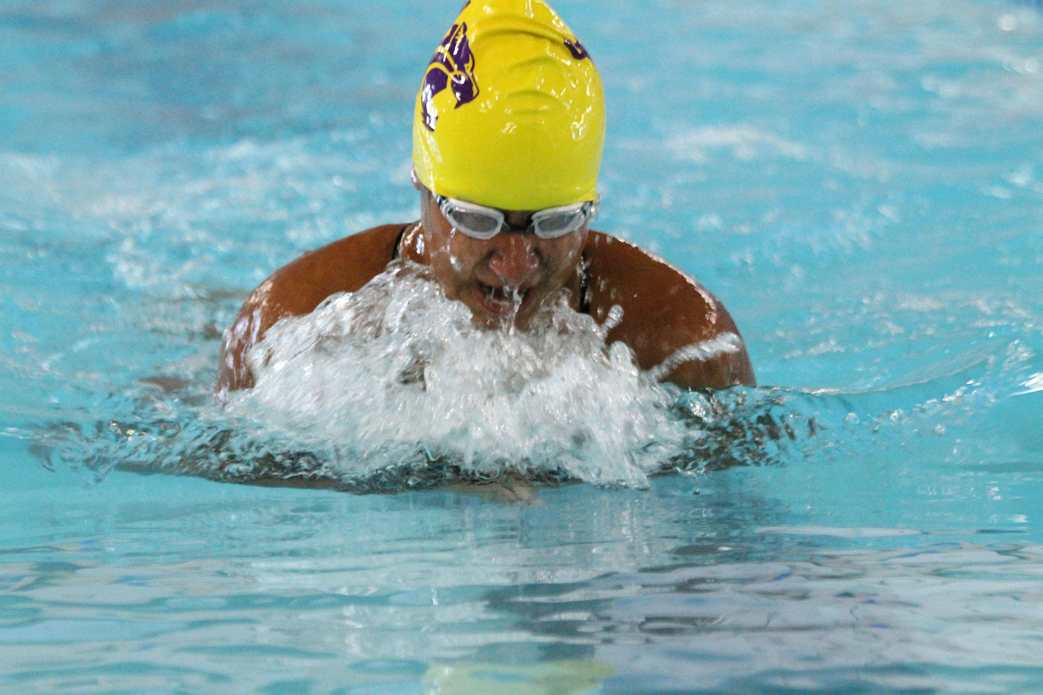 Diandra Dominguez swims to first place in the 100-meter breaststroke. (Photo by Jim Waller/Whidbey News-Times)
