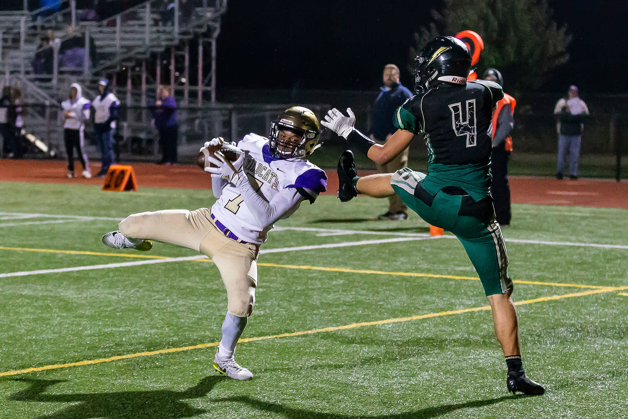 Dorian Hardin hauls in a touchdown pass in front of the Chargers’ Landyn Olson (4).(Photo by John Fisken)