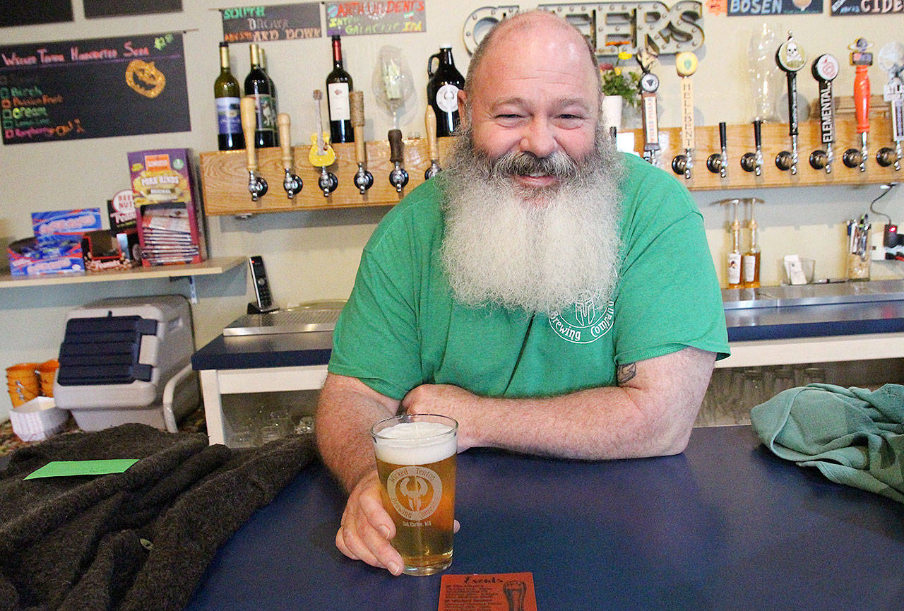 Terry Boese, owner of Wicked Teuton Brewing Company, says he wishes his beard was longer so he could dress up as a wizard for a Harry Potter trivia night happening later this month. The brewer and the library are teaming up to offer two Booktoberfest trivia events, starting Thursday. Photo by Laura Guido/Whidbey News-Times