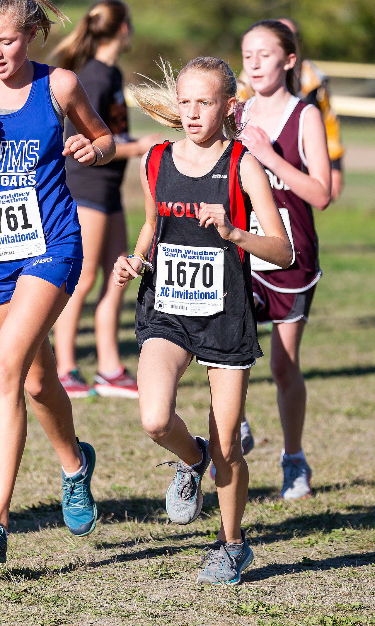 Claire Mayne records the second-best finish for a Coupeville girl, taking 11th overall.(Photo by John Fisken)