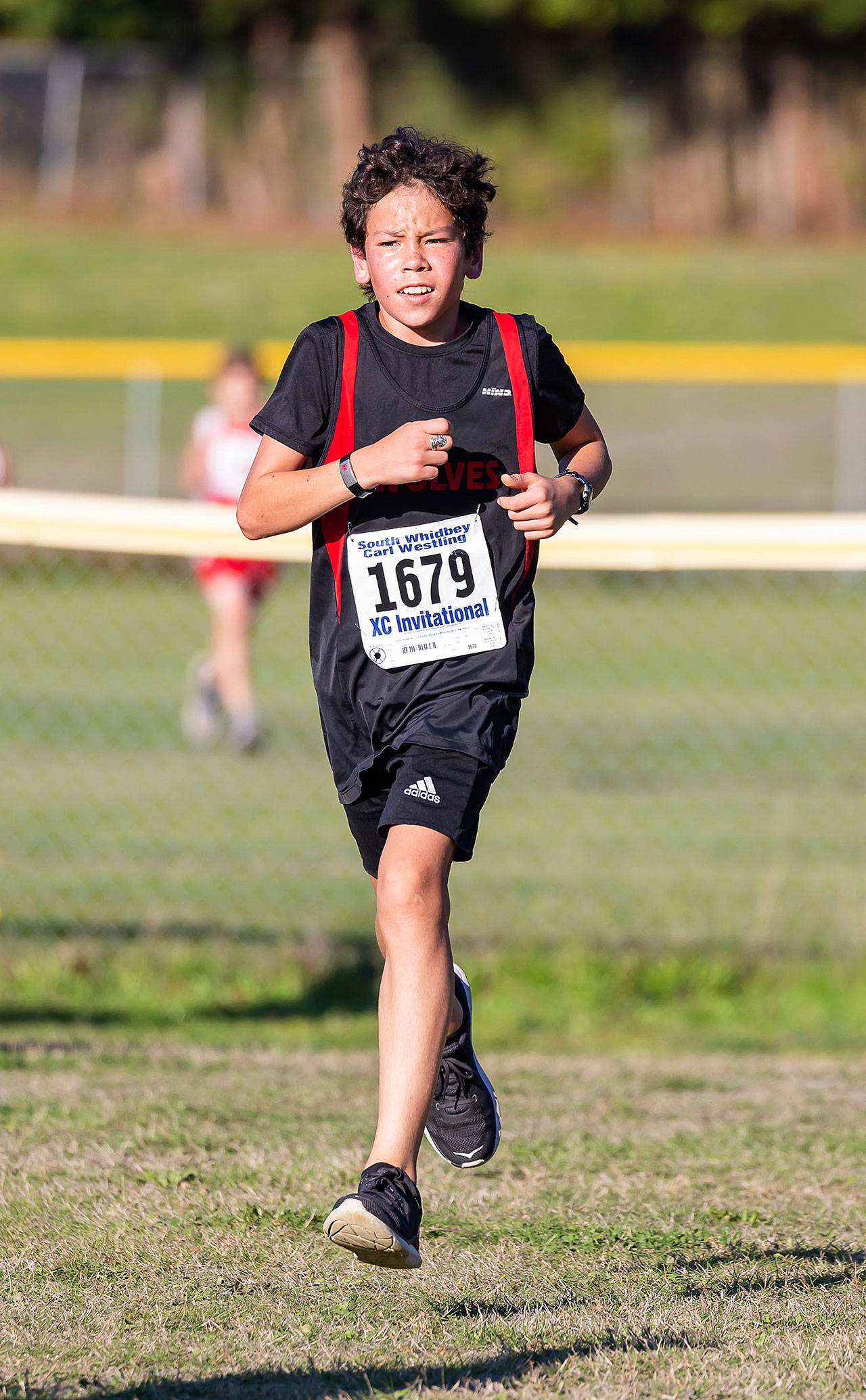 Hank Milnes finishes 17th, good for second among Coupeville boys.(Photo by John Fisken)