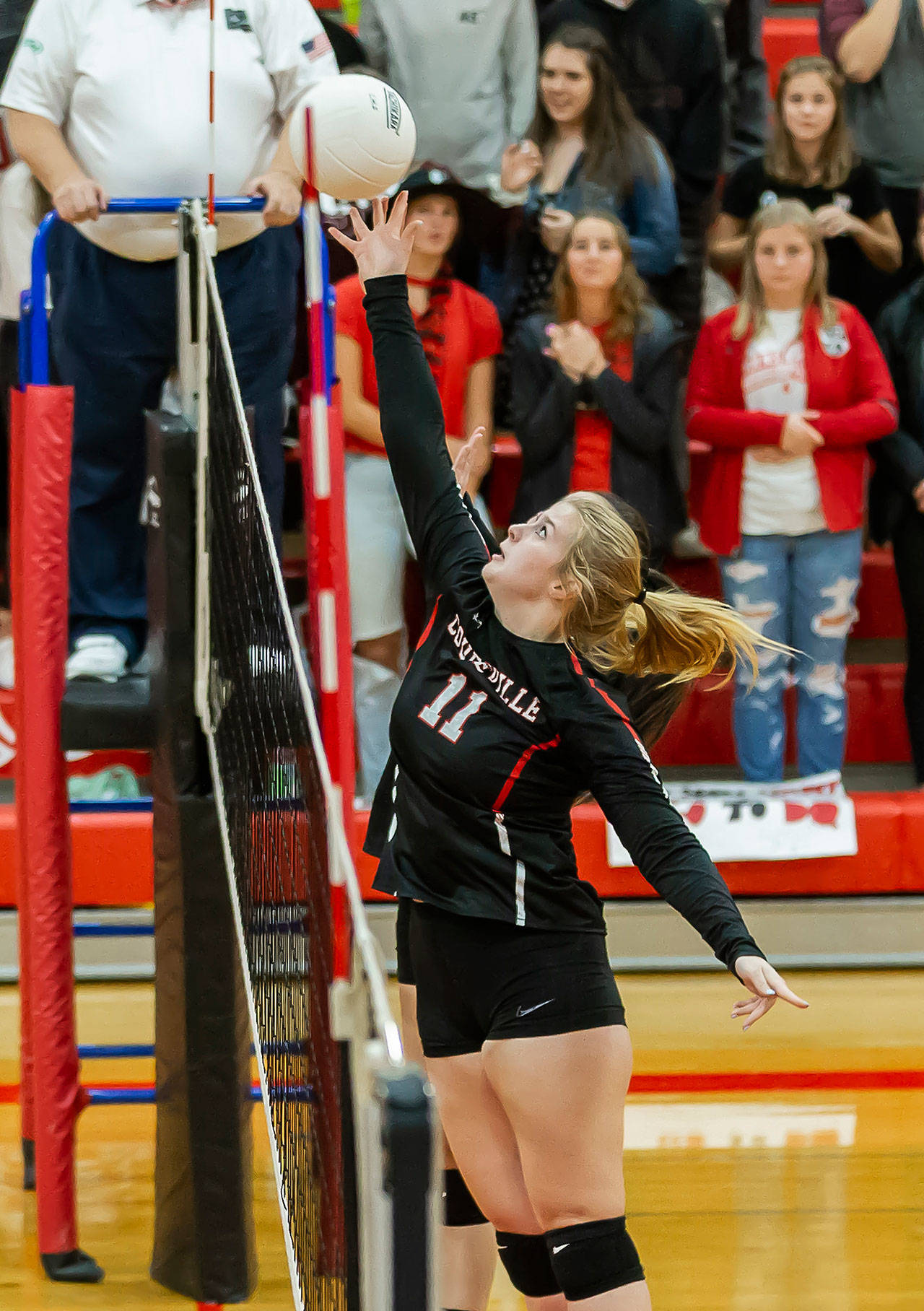 Hannah Davidson tips in the win over Sultan Wednesday.(Photo by John Fisken)
