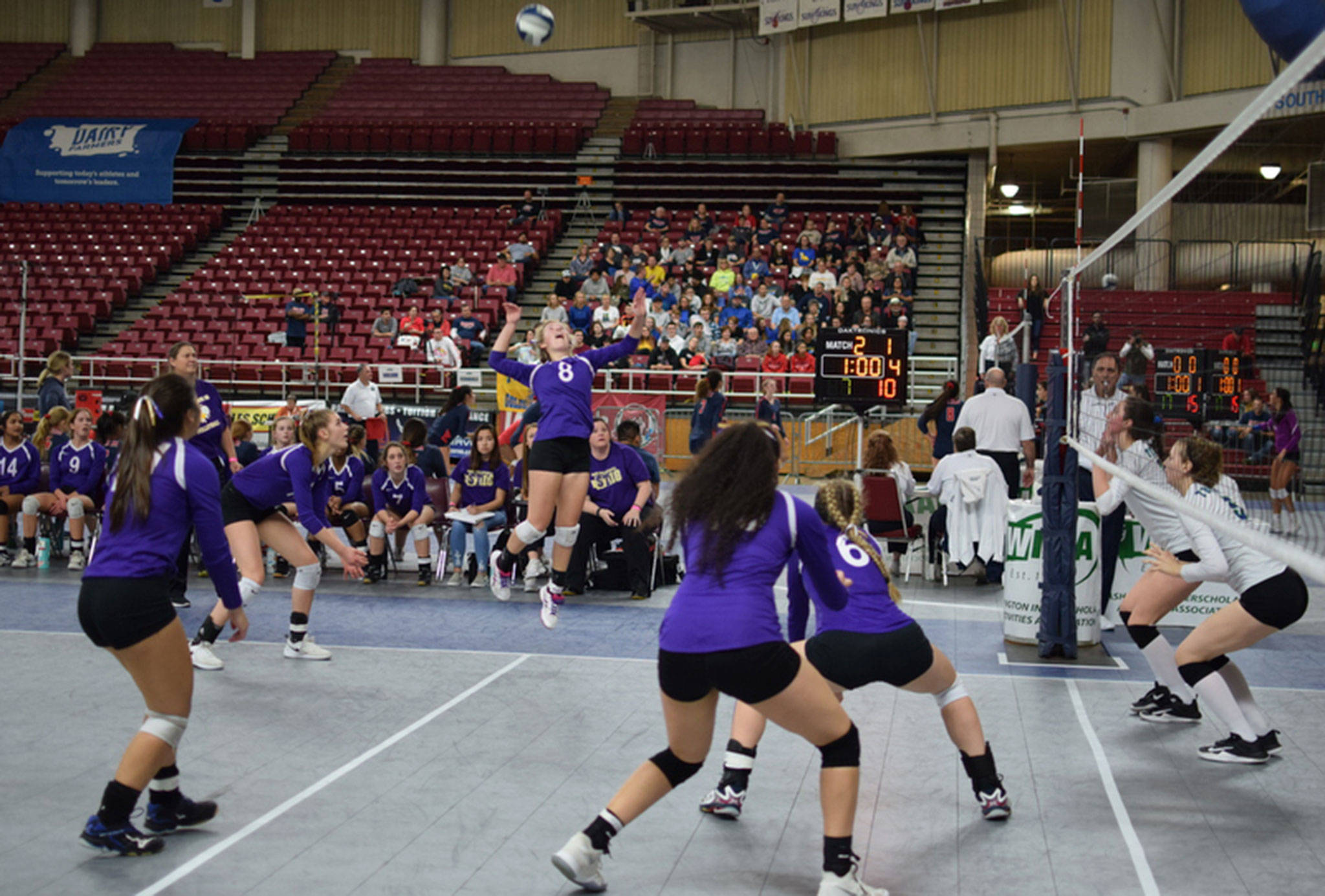 Cami Bristow rises for a kill against Mountain View in the state tournament. (Photo by Steve Bristow)