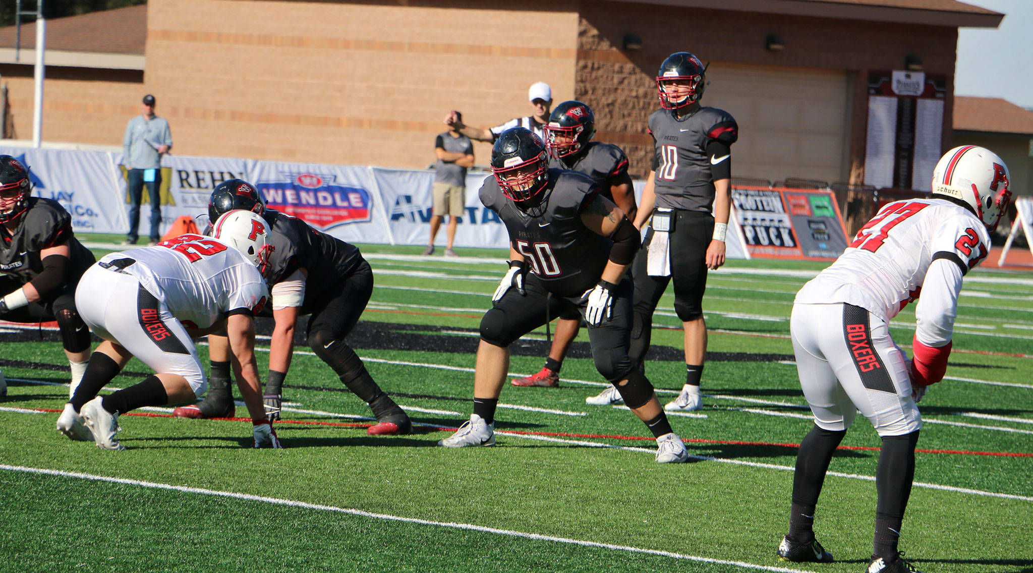 Tyler Adamson (50), playing for Whitworth University, was named to the all-Northwest Conference first team for the third time this season. (Photo courtesy of Whitworth Athletics)