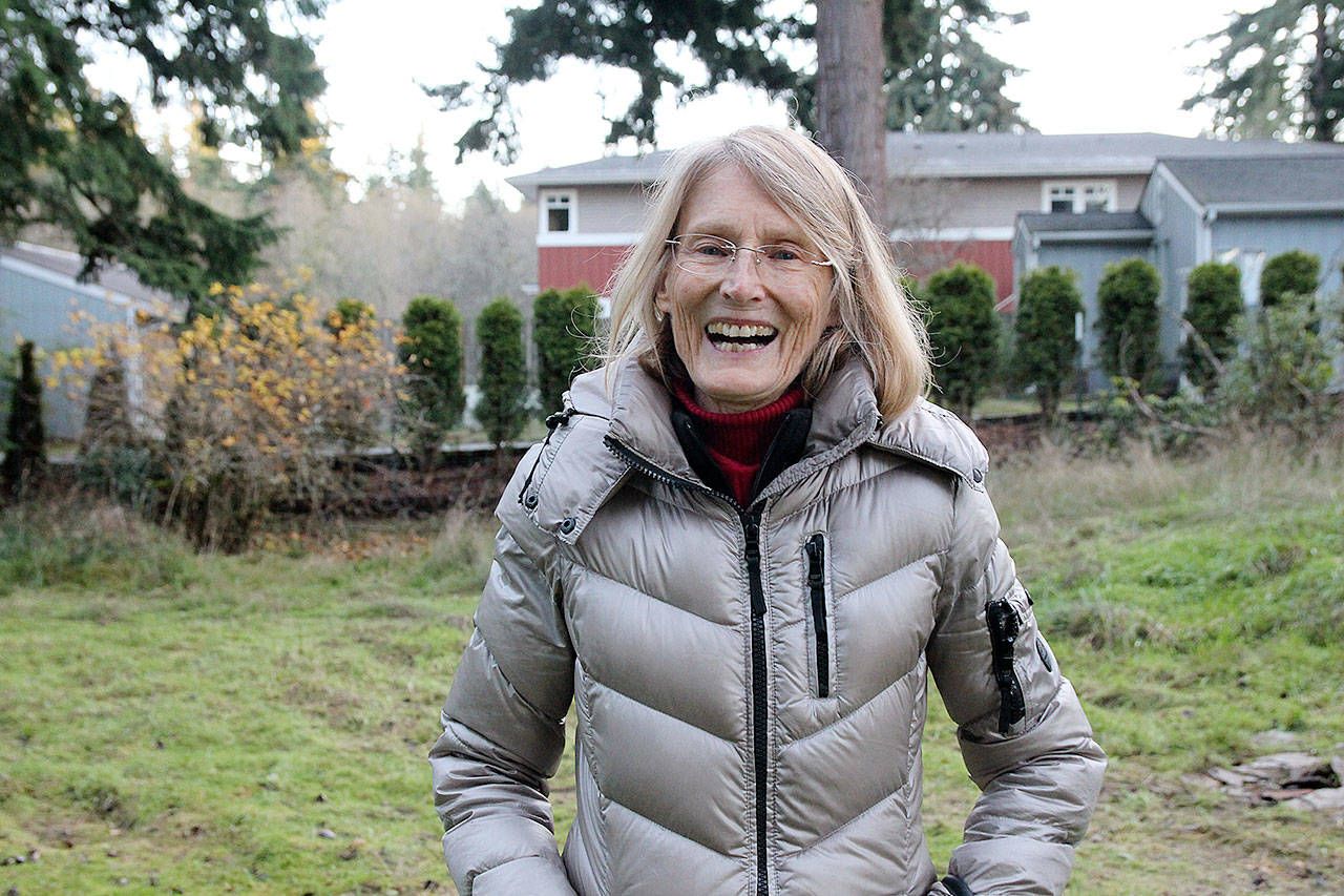 Coyla Shepard, founder of Tiny Houses in the Name of Christ, stands in front of the property the nonprofit recently purchased in hopes of building six tiny homes for low-income families and individuals. Photo by Laura Guido/Whidbey News Group