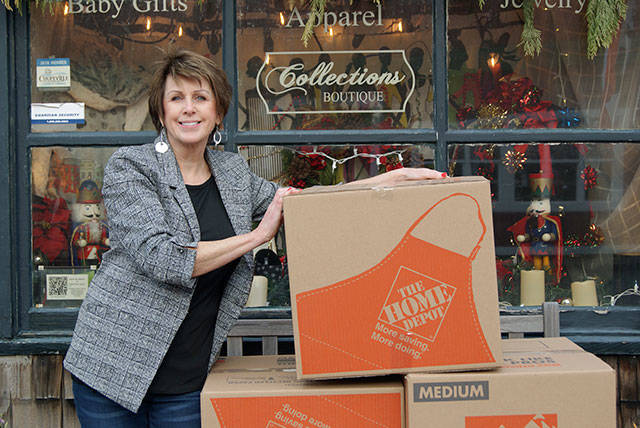 Photo by Maria Matson/Whidbey News-Times.                                &lt;em&gt;Oak Harbor resident Cheryl Nunn stands in front of her Coupeville shop, Collections Boutique, with boxes that will contain her next large shipment of donated women’s clothing to Chico, Calif. Nunn said she is glad to be able to provide assistance using her niche industry to aid women in need after the devastating wildfires.&lt;/em&gt;